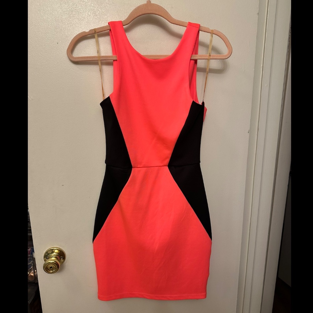 Hot pink and black dress with cut-out back. Size small